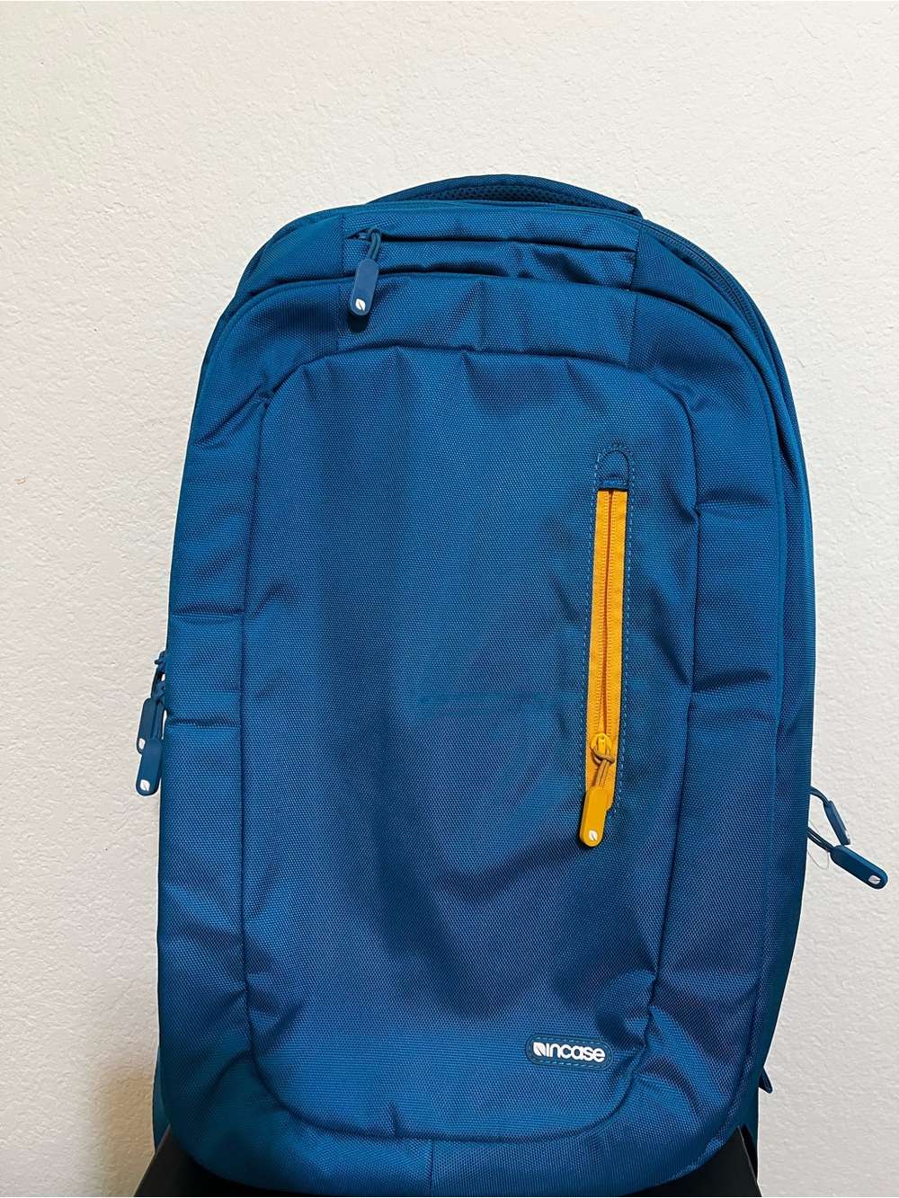 Incase Men's Deep Blue Backpack with Yellow Zipper